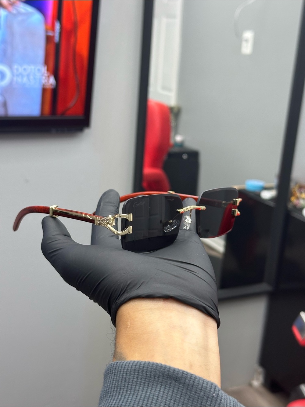 Cartier Rimless Sunglasses with Red Tortoiseshell Temples and Gold Hardware